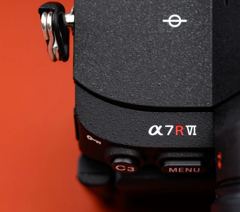 Close-up view of a black Sony Alpha 7R VI camera body.